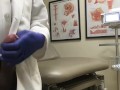 Doctor Relieving Stress In Hospital Exam Room