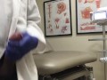 Doctor Relieving Stress In Hospital Exam Room