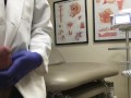 Doctor Relieving Stress In Hospital Exam Room