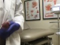 Doctor Relieving Stress In Hospital Exam Room