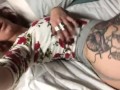 Flirty tattooed redhead shows off ass and feet 