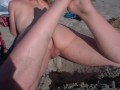 Daring MILF pees at the nude beach in San Diego