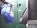 Nerdy Girl Hosing Down A Urinal With Her Piss