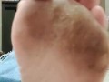 Wiggling and scrunching my big dirty stained feet in front of you