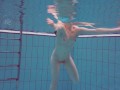 Half euro babe taking swimming classes in public pool