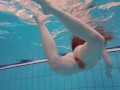 Half euro babe taking swimming classes in public pool