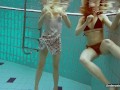 Milana and Alice enjoy themselves in the pool