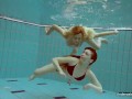 Milana and Alice enjoy themselves in the pool