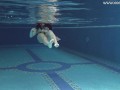 Brunette Spanish Diana Rius swimming topless