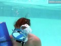 Minnie Manga blows her blue dildo in the pool