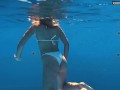 Being naked underwater brings her sexual pleasures