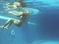 Lina Mercury swimming sexually in the pool
