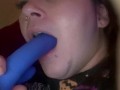 Pretty face sucks pretty dildo