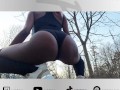 Slutty Ebony shakes ass and shows her holes in forest near public bridge