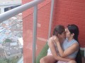 passionate kisses and touching my girlfriend's pussy on the balcony