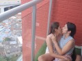 passionate kisses and touching my girlfriend's pussy on the balcony
