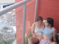 passionate kisses and touching my girlfriend's pussy on the balcony