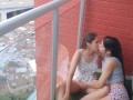 passionate kisses and touching my girlfriend's pussy on the balcony
