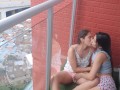 passionate kisses and touching my girlfriend's pussy on the balcony