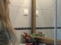 Sexy and horny blonde wife in plead skirt takes off her underwear red thong in the bathroom to show her tight pussy and booty