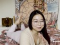 Ersties - Cute Babe From China Rubs Her Shaved Pussy Before Grabbing a Dildo