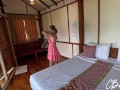 Stepfather and stepdaughter share a bed in a hotel room