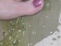 Smashing juicy grapes under my big toes close up under and side pov