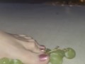 Smashing juicy grapes under my big toes close up under and side pov