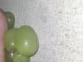 Smashing juicy grapes under my big toes close up under and side pov