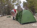 A gorgeous blonde without panties is assembling a tent. For lovers of peeping