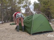 A gorgeous blonde without panties is assembling a tent. For lovers of peeping