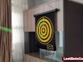 Hot Redhead plays darts with her game and loses the bet