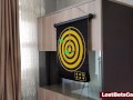 Hot Redhead plays darts with her game and loses the bet