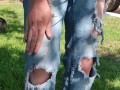 Smearing mud and cake into my ripped jeans front and back