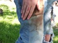 Smearing mud and cake into my ripped jeans front and back