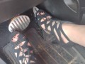 Big feet pedal pumping the gas pedal in strappy sexy black heels