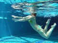 Cute wifey gets naked quickly in the pool