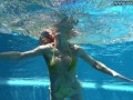 Cute wifey gets naked quickly in the pool
