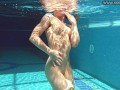 Cute wifey gets naked quickly in the pool