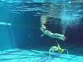 Cute wifey gets naked quickly in the pool