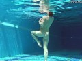 Cute wifey gets naked quickly in the pool