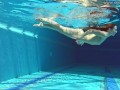 Cute wifey gets naked quickly in the pool
