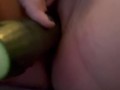 Amelia fucks a cucumber and squirts everywhere