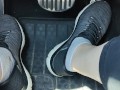 Revving my car with my sketchers sneakers