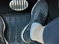 Revving my car with my sketchers sneakers