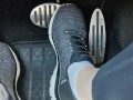 Revving my car with my sketchers sneakers
