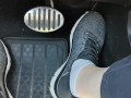 Revving my car with my sketchers sneakers