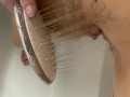 Masturbation with shower head until she had strong shaking orgasm