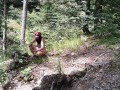 Milf woman with big tits jerking fat dick in the woods