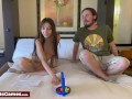 Cute couple playing a connect 4 strip game and getting naked together